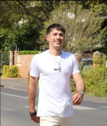 The Light Tee, front view, worn outdoors